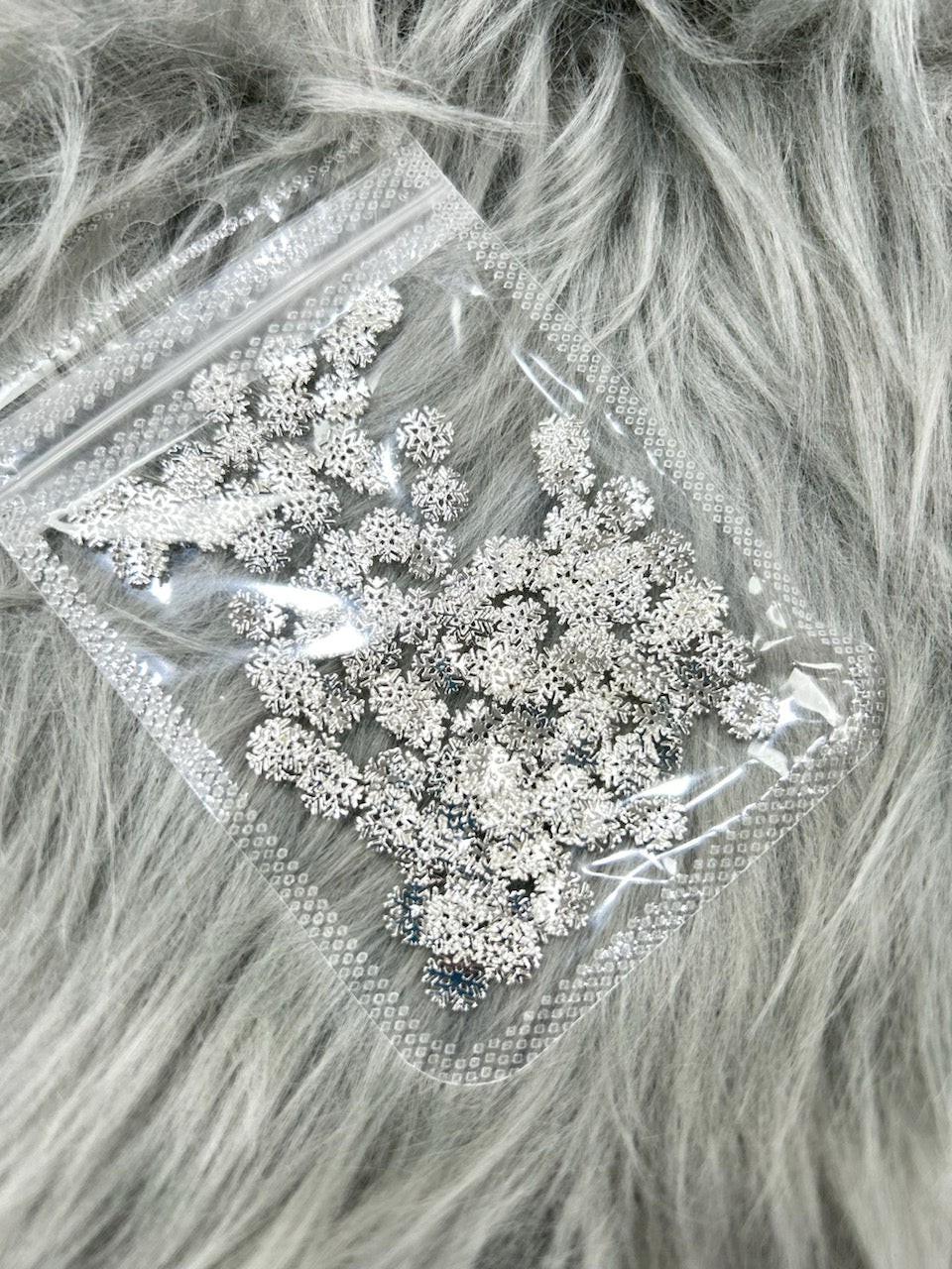 SILVER SNOW FLAKE CHARM BAG
